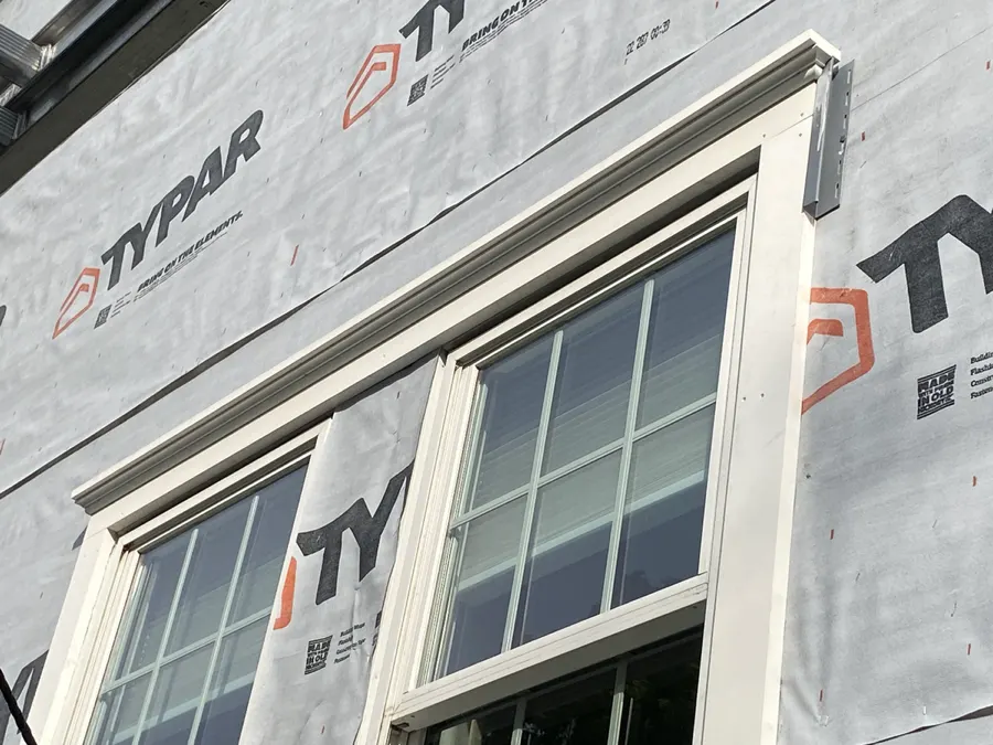 New window installation with weather barrier wrap